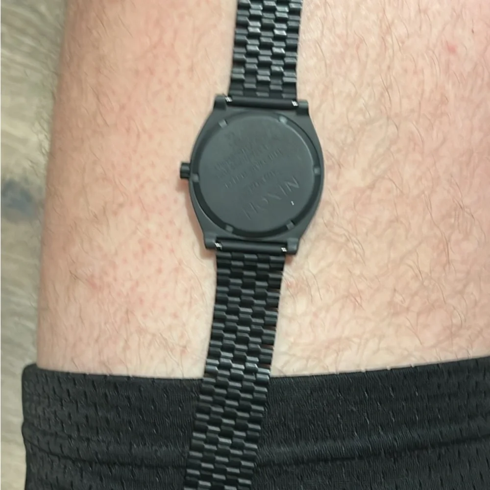 Nixon Black and Gold Men's Watch